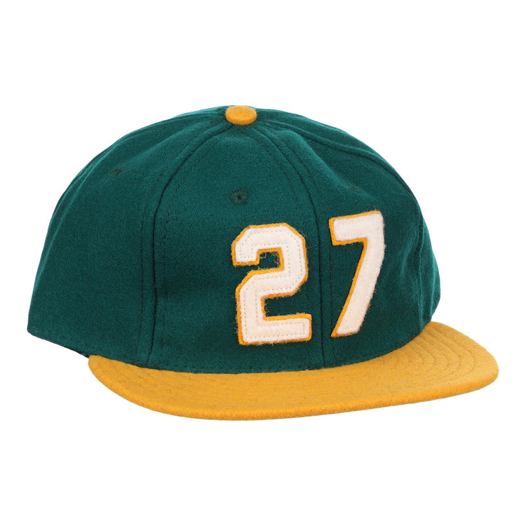 The Catfish Hunter Signature Series Ballcap by Ebbets Field Flannels is a green vintage wool cap with a yellow brim and button, featuring number 27 in white with yellow trim—an homage to National Baseball Hall of Fame legends.