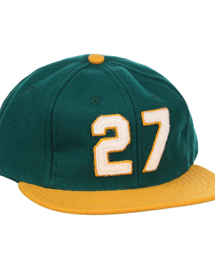 The Catfish Hunter Signature Series Ballcap by Ebbets Field Flannels is a green vintage wool cap with a yellow brim and button, featuring number 27 in white with yellow trim—an homage to National Baseball Hall of Fame legends.