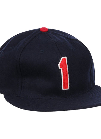 The Ozzie Smith Signature Series Ballcap by Ebbets Field Flannels is a dark blue vintage wool cap, made in the USA, with a red top button and a bold red-and-white number 1 on the front.