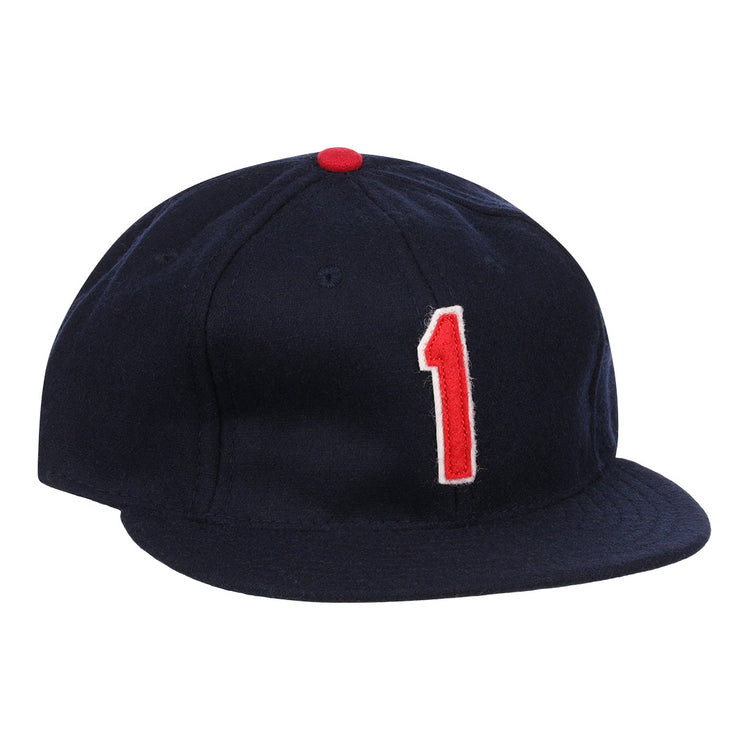 The Ozzie Smith Signature Series Ballcap by Ebbets Field Flannels is a dark blue vintage wool cap, made in the USA, with a red top button and a bold red-and-white number 1 on the front.