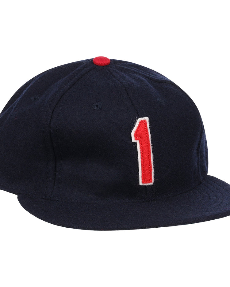 The Ozzie Smith Signature Series Ballcap by Ebbets Field Flannels is a dark blue vintage wool cap, made in the USA, with a red top button and a bold red-and-white number 1 on the front.
