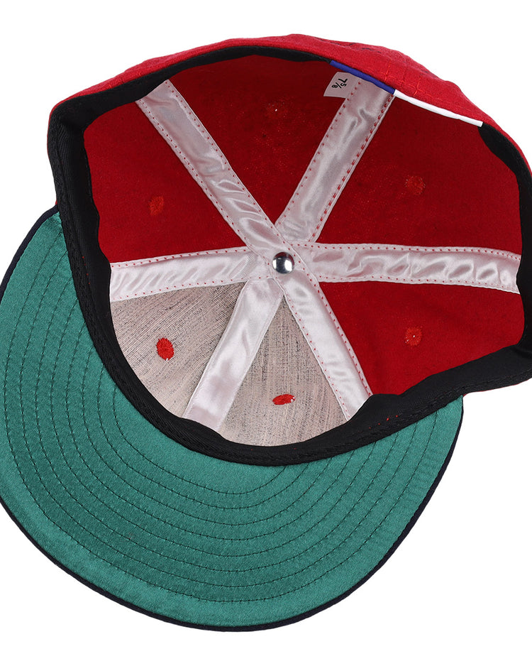 Inside view of the Ebbets Field Flannels Harmon Killebrew Signature Series Ballcap, featuring a vintage wool design with a green brim, white support seams, and a silver crown button.
