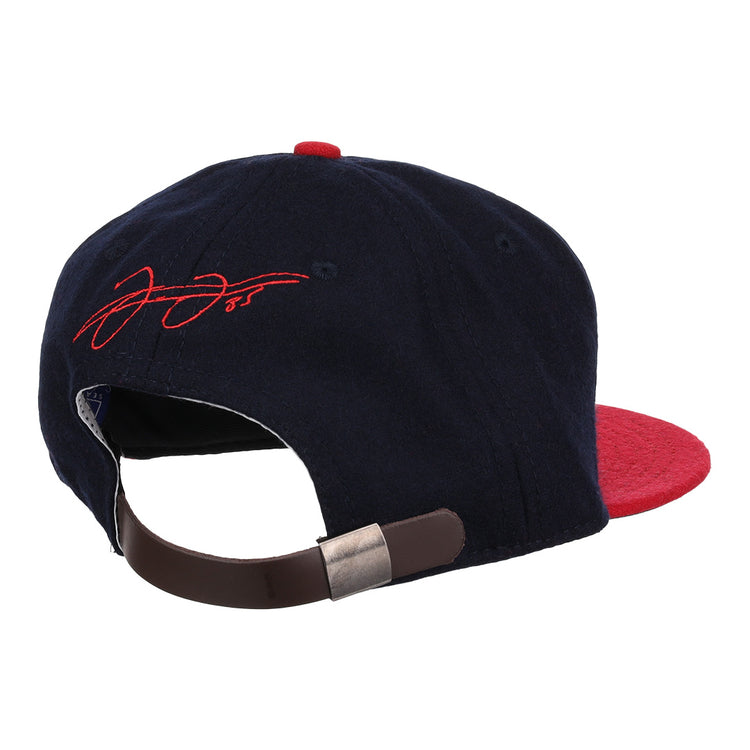 The Frank Thomas Signature Series Ballcap - Navy by Ebbets Field Flannels is a navy and red cap inspired by vintage Chicago White Sox styles, with a brown adjustable strap, metallic clasp, and red signature embroidery on the rear.
