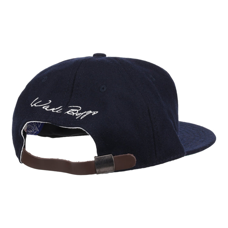 The Ebbets Field Flannels Wade Boggs Signature Series Ballcap in navy wool is shown from the back, featuring a brown adjustable strap and Wade Boggs’s white embroidered signature above the opening.