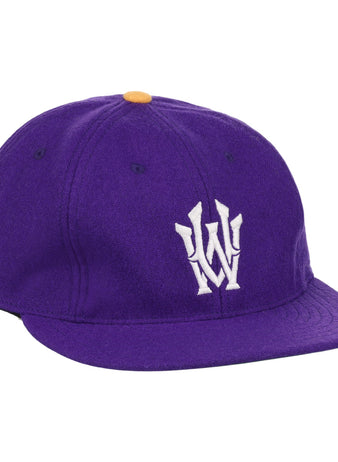 The EFF University of Washington 1936 Rowing Vintage Ballcap is a purple wool cap featuring an official white W logo on the front and a small yellow top button.