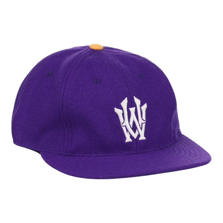 The EFF University of Washington 1936 Rowing Vintage Ballcap is a purple wool cap featuring an official white W logo on the front and a small yellow top button.