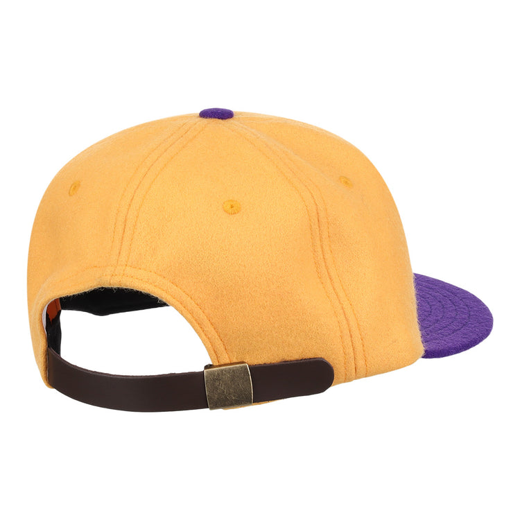 The EFF University of Washington 1936 Rowing Vintage Ballcap in gold features a purple brim and an adjustable dark brown strap with a brass buckle, shown here from the back.
