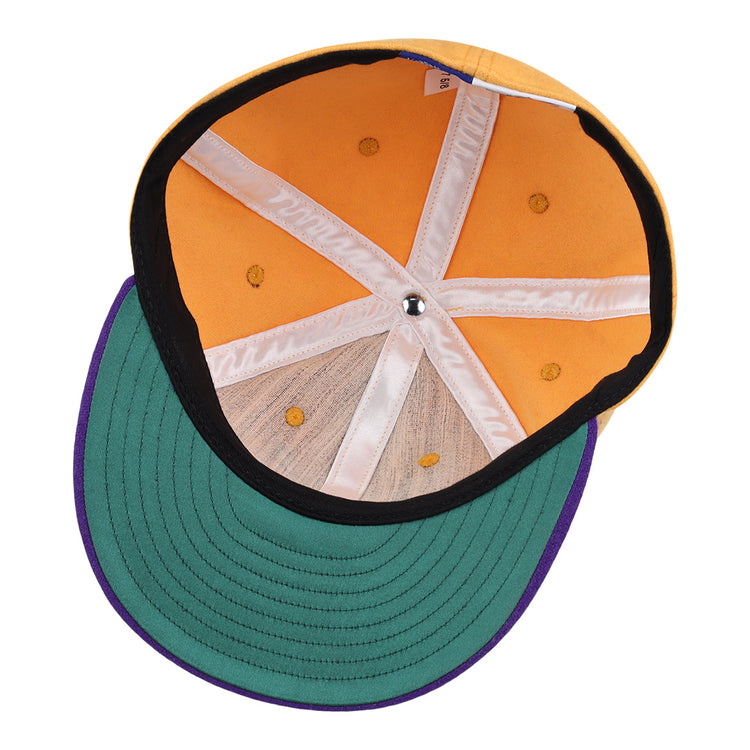 The EFF University of Washington 1936 Rowing Vintage Ballcap in gold features an orange crown, green brim, purple trim, and visible white interior seams and stitching on the underside.