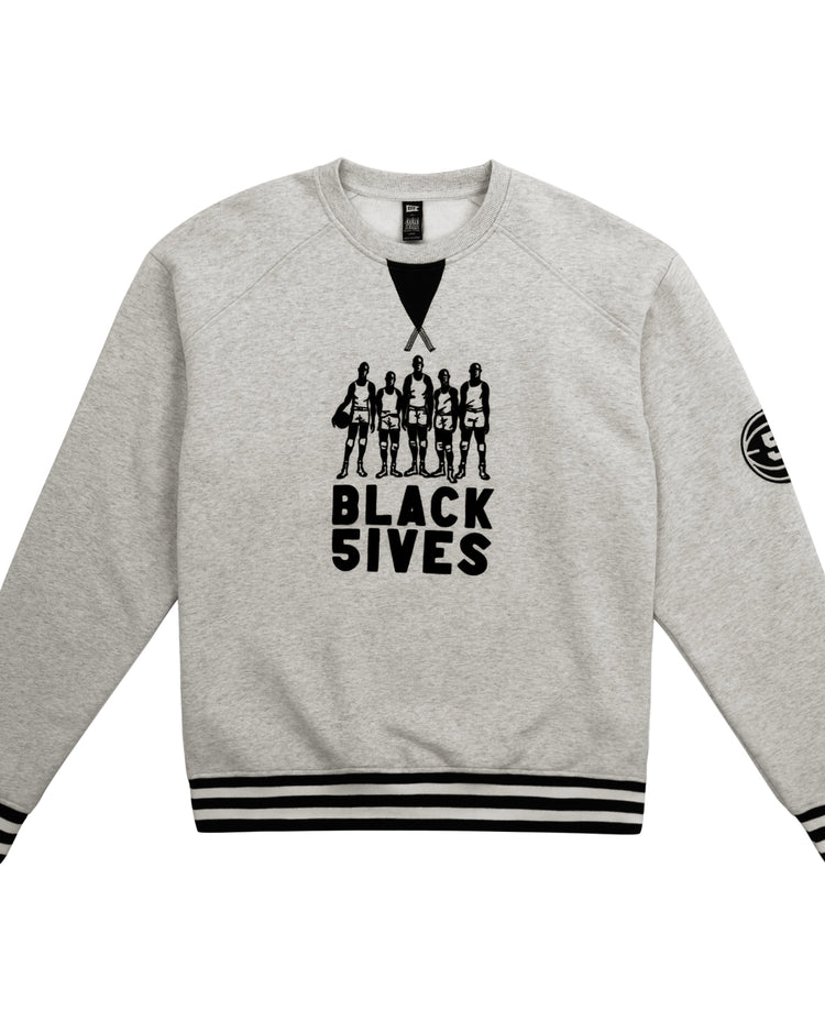The EFF Black Fives Crewneck is a light gray sweatshirt with black striped cuffs and hem, featuring five basketball players and BLACK 5IVES on the front, plus a round patch on the left sleeve—celebrating Black basketball history.