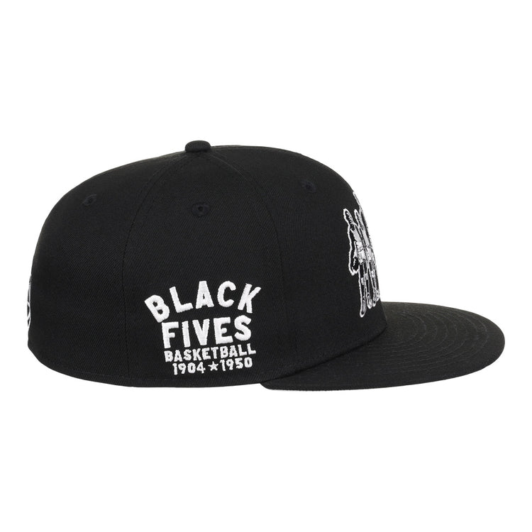 The Black Fives Fitted Ballcap by Ebbets Field Flannels is a black cap with white BLACK FIVES BASKETBALL 1904-1950 embroidery on the side and a small image of Black basketball players on the front.