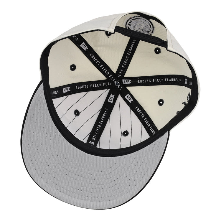 The inside view of the Black Fives Snapback Ballcap by Ebbets Field Flannels features black stitching, gray pinstriped inner panels, and branded taping—celebrating Black Fives and Black basketball history.
