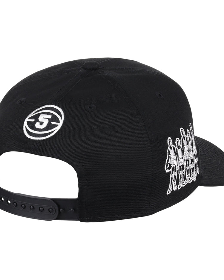 The Black Fives Snapback A-Frame by Ebbets Field Flannels is a black cap featuring a white embroidered 5 in a circle on the back and five outlined figures on the side, honoring Black Fives and basketball history. Adjustable strap included.