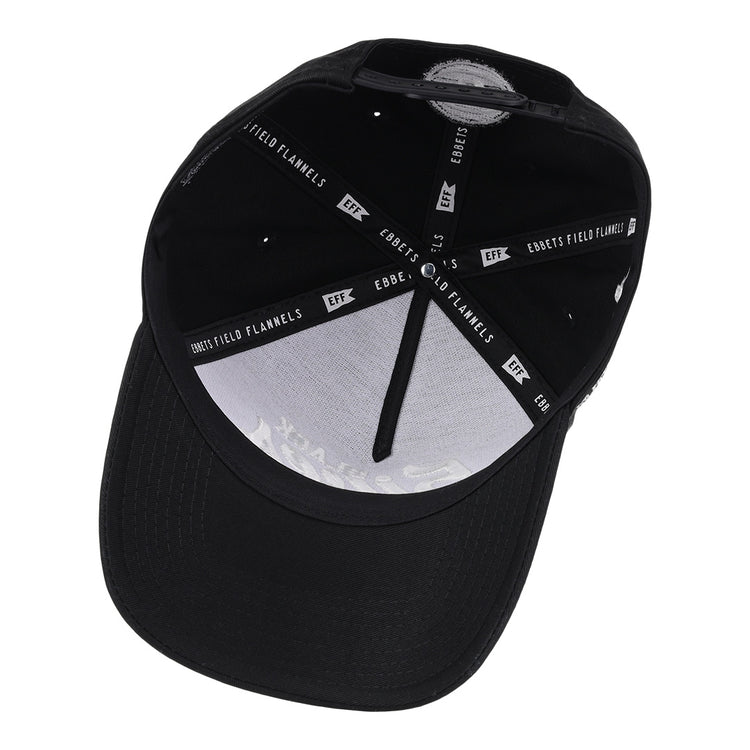 The Black Fives Snapback A-Frame by Ebbets Field Flannels features visible white stitching, interior branded tape with Ebbets Field Flannels and EFF logos, and a white sweatband—honoring Black basketball history and the legacy of the Black Fives.