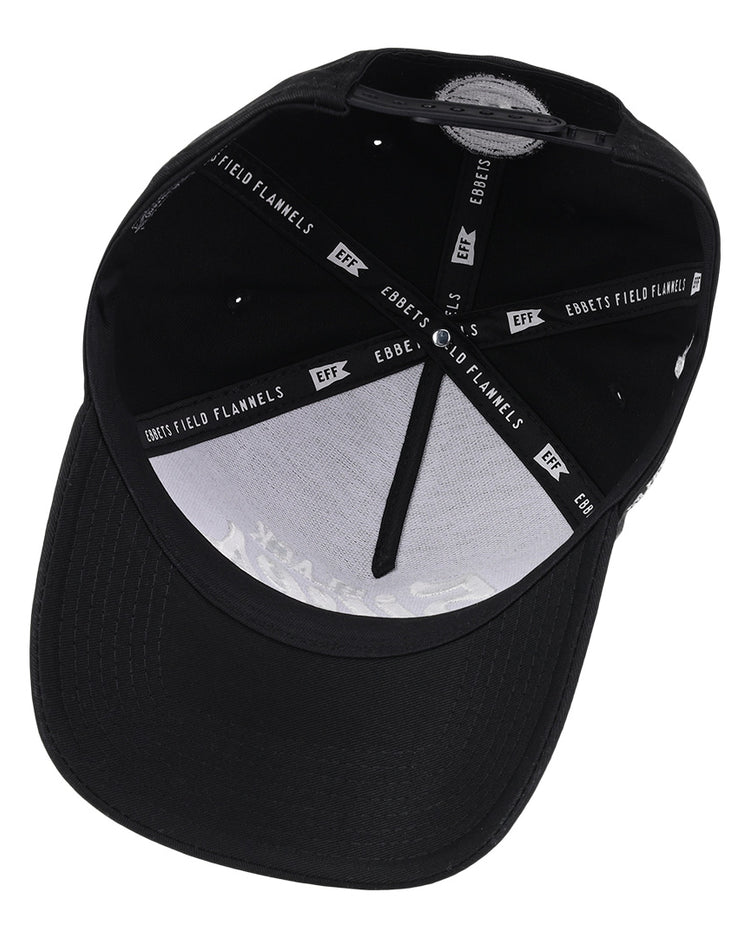 The Black Fives Snapback A-Frame by Ebbets Field Flannels features visible white stitching, interior branded tape with Ebbets Field Flannels and EFF logos, and a white sweatband—honoring Black basketball history and the legacy of the Black Fives.