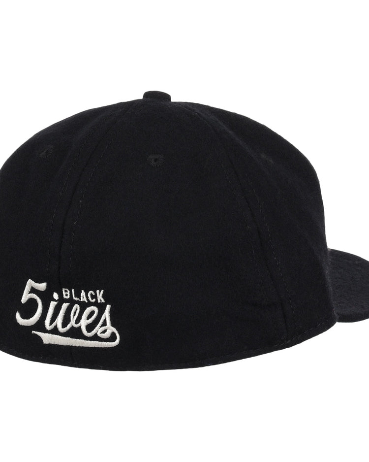 The Ebbets Field Flannels Black Fives Wool Ballcap features white embroidered BLACK 5ives text on the back, blending vintage ballcap style with Black Fives legacy.