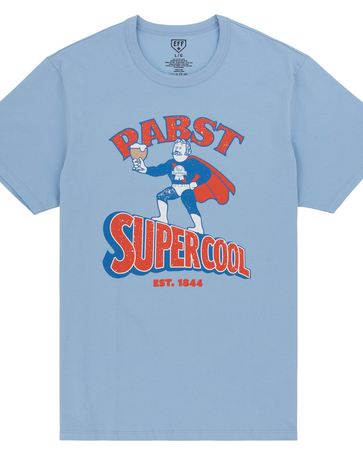 The PBR EFF Vintage Beer T-Shirt by Ebbets Field Flannels is a light blue tee with a cartoon superhero holding a beer and “Pabst Super Cool Est. 1844” in red, blue, and white, honoring Pabst Blue Ribbon’s Milwaukee legacy.