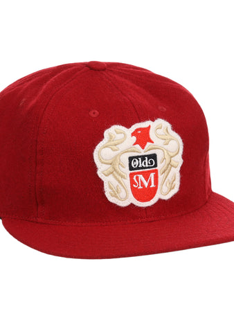 The Old Milwaukee EFF Vintage Beer Wool Ballcap by EFF is a red cap with an embroidered bird, Olde, and SM crest on the front. It features a flat brim and structured crown, ideal for classic American Lager fans.