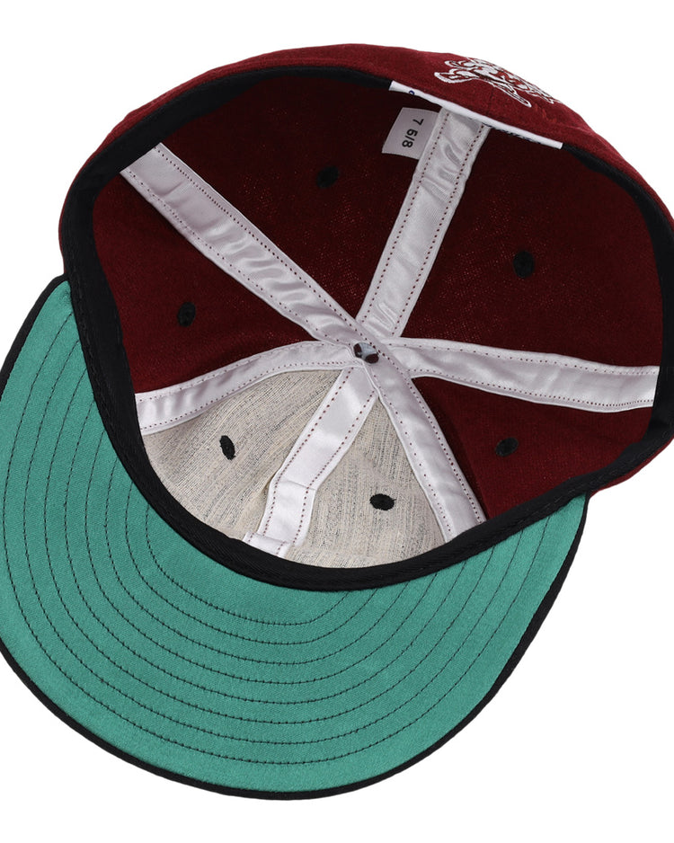 Inside the EFF Mississippi State Bulldogs Collegiate Wool Ballcap: green underbrim, white inner seams, red interior, and a size label marked B9 2.