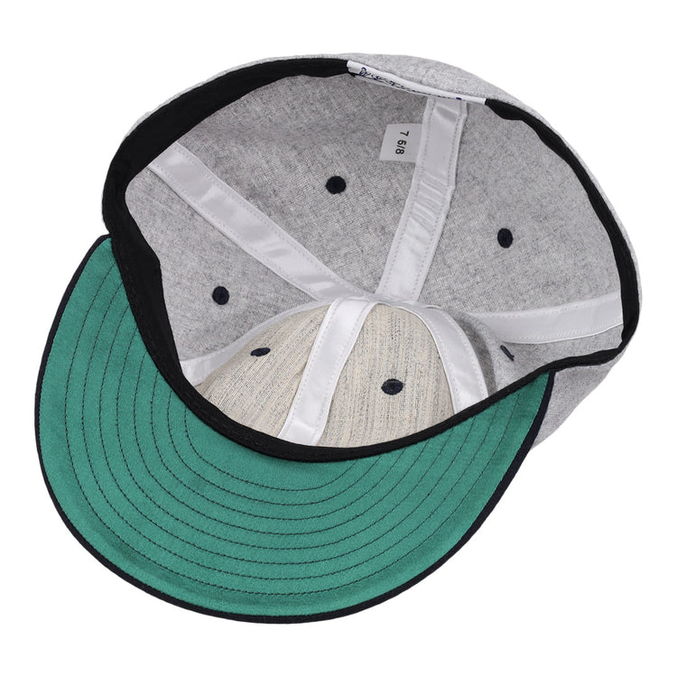 The image shows the inside of an EFF University of Nevada Wolf Pack Mascot Collegiate Wool Ballcap featuring a gray finish, green underbrim, black edge lining, white seams, and a size 7 1/8 label—an officially licensed college vault item.