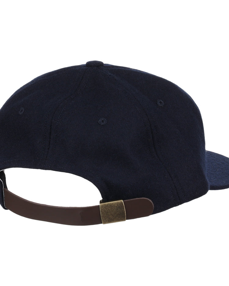 A navy blue vintage wool cap by EFF, shown from the back with an adjustable brown strap and brass buckle—an officially licensed University of Nevada Wolf Pack collegiate ballcap.