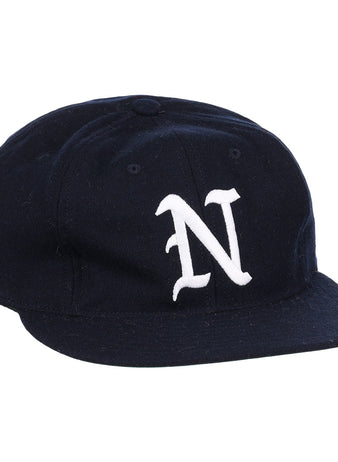 The EFF University of Nevada Wolf Pack Collegiate Wool Ballcap is a vintage navy blue hat with a curved brim and a bold white embroidered N on the front, officially licensed from the college vault.
