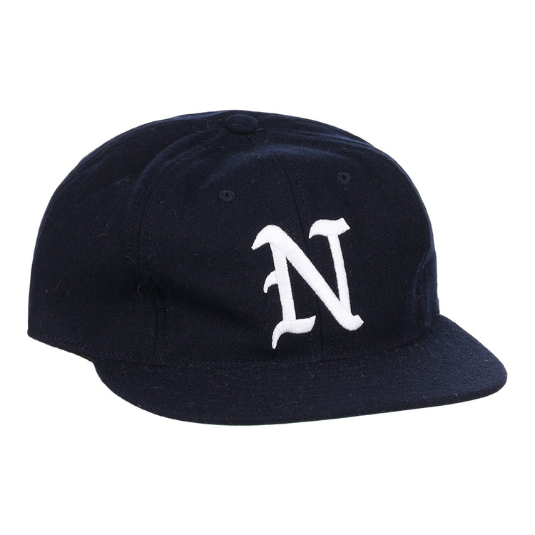 The EFF University of Nevada Wolf Pack Collegiate Wool Ballcap is a vintage navy blue hat with a curved brim and a bold white embroidered N on the front, officially licensed from the college vault.