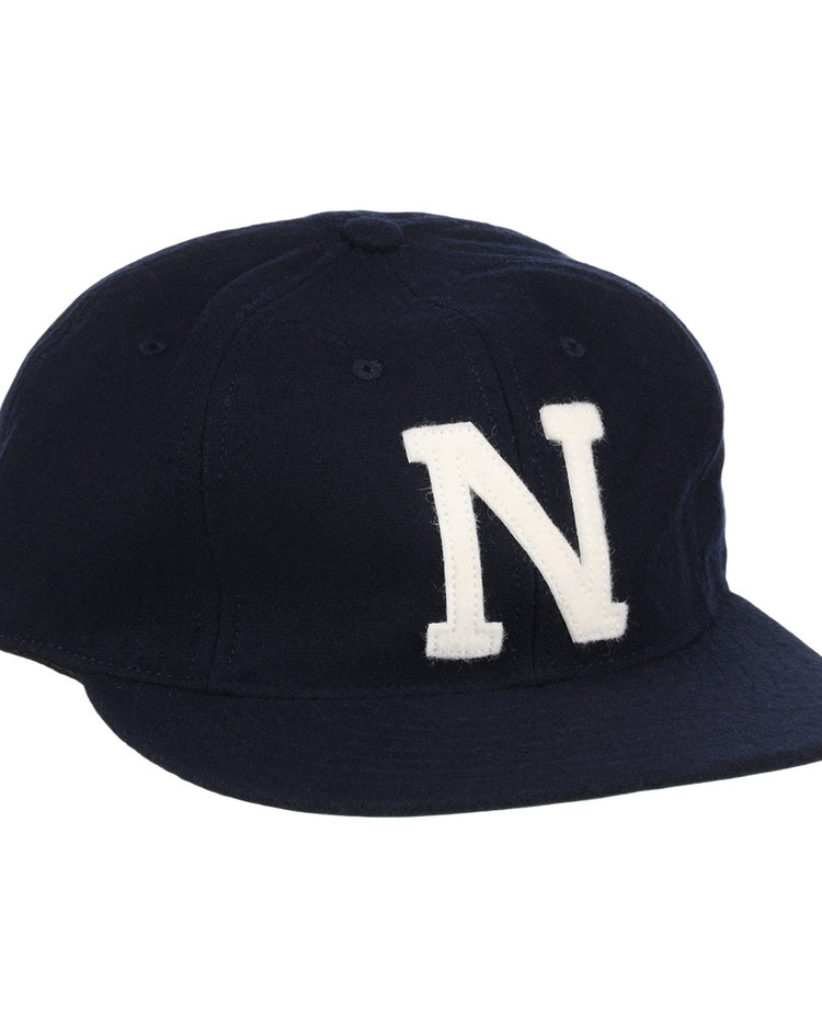 The EFF University of Nevada Wolf Pack Patch Collegiate Wool Ballcap is a navy blue vintage-style cap with a bold white N on the front, ideal for fans wanting classic college sports flair.