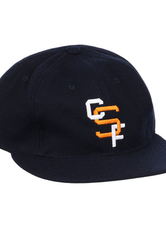 The EFF Cal State Fullerton 1965 Vintage Ballcap is a black cap with a curved brim and overlapping white and orange CC and SF embroidery on the front.
