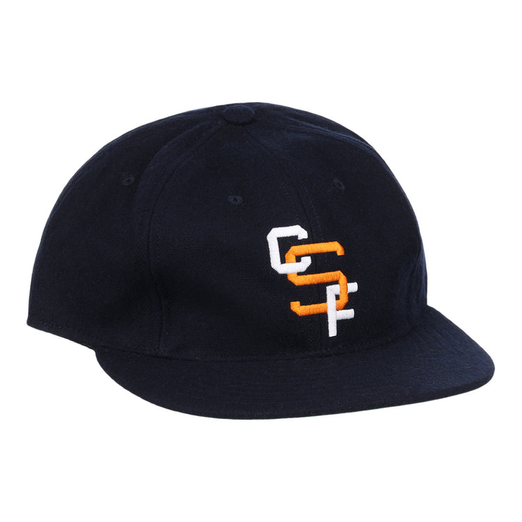 The EFF Cal State Fullerton 1965 Vintage Ballcap is a black cap with a curved brim and overlapping white and orange CC and SF embroidery on the front.