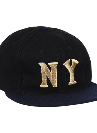 The EFF New York Black Yankees Gilded Collection Ballcap features a black crown, navy blue brim, and gold NY embroidery—an ideal tribute to the Negro National League.