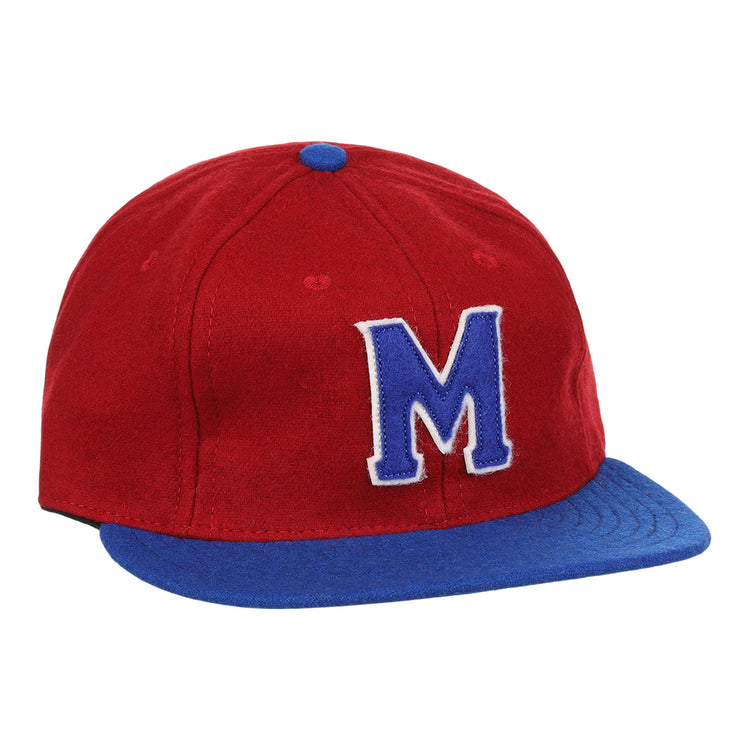 The EFF Memphis Red Sox 1946 Vintage Ballcap features a red wool crown, blue visor, bold blue M outlined in white, and a blue button on top—authentic details inspired by the classic Negro Leagues team.