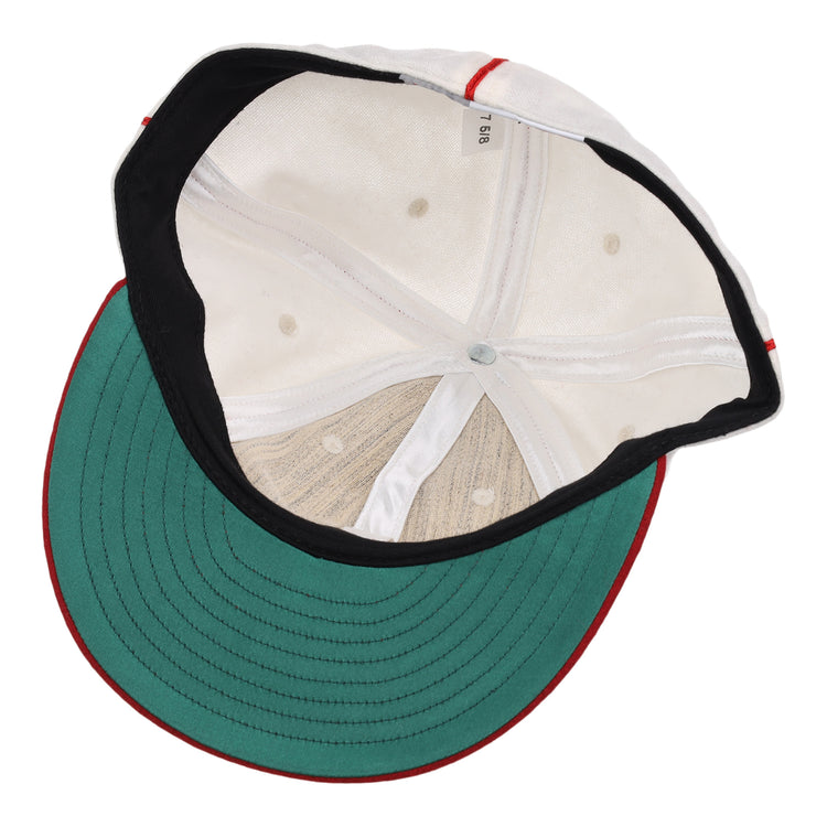 The image displays the inside of an EFF Washington Elite Giants 1936 Vintage Ballcap, featuring a green underbrim, black sweatband, red piping, and a size tag marked 7 1/8.