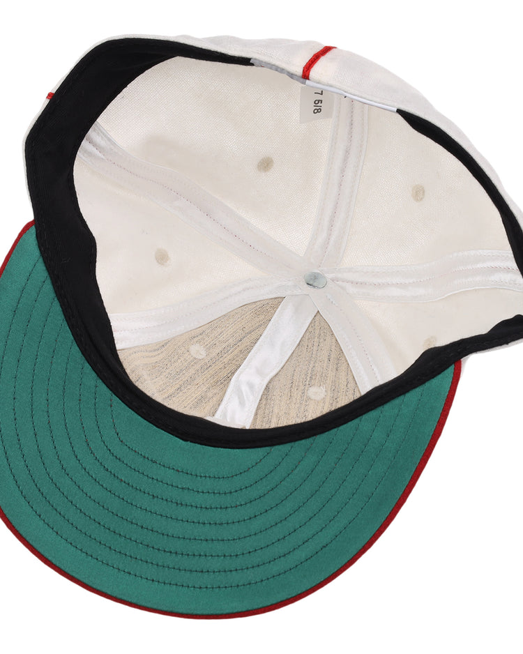 The image displays the inside of an EFF Washington Elite Giants 1936 Vintage Ballcap, featuring a green underbrim, black sweatband, red piping, and a size tag marked 7 1/8.