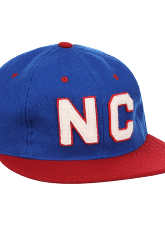 The EFF Nashville Cubs 1946 Vintage Ballcap is a blue wool cap with a red brim and button, showcasing large white NC letters outlined in red on the front—a tribute to Negro Southern League history.