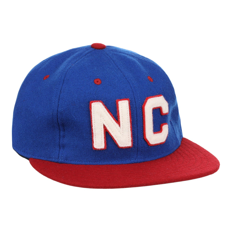 The EFF Nashville Cubs 1946 Vintage Ballcap is a blue wool cap with a red brim and button, showcasing large white NC letters outlined in red on the front—a tribute to Negro Southern League history.
