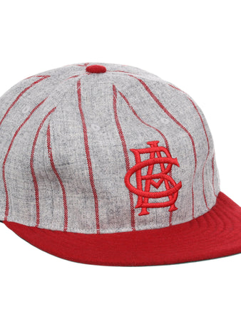 The EFF Indianapolis ABCs 1916 Vintage Ballcap features a gray design with red vertical pinstripes, a red visor, and a vintage-style embroidered STL logo, inspired by classic Negro Leagues styles.