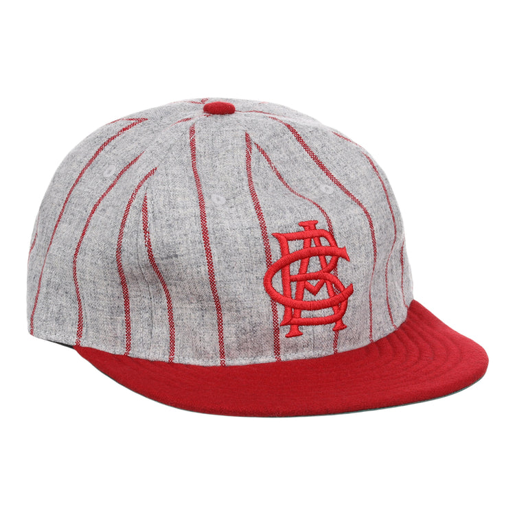 The EFF Indianapolis ABCs 1916 Vintage Ballcap features a gray design with red vertical pinstripes, a red visor, and a vintage-style embroidered STL logo, inspired by classic Negro Leagues styles.