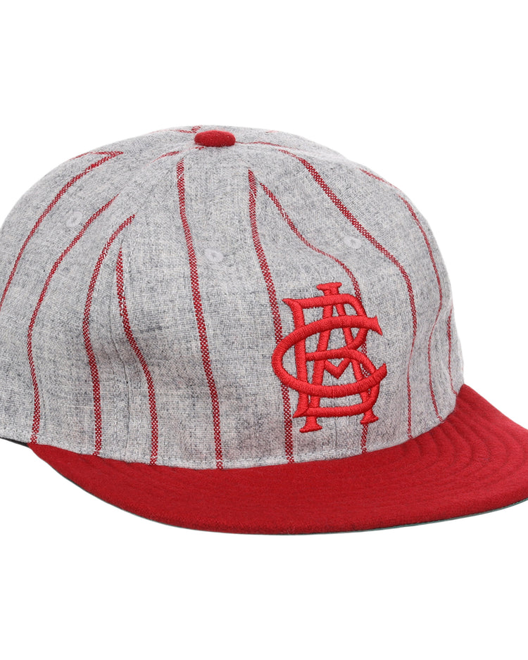 The EFF Indianapolis ABCs 1916 Vintage Ballcap features a gray design with red vertical pinstripes, a red visor, and a vintage-style embroidered STL logo, inspired by classic Negro Leagues styles.