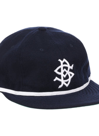 The EFF Shreveport Black Sports 1932 Vintage Ballcap features navy blue fabric, a white embroidered front logo, and a white stripe above the brim, inspired by classic Texas-Louisiana League wool caps.