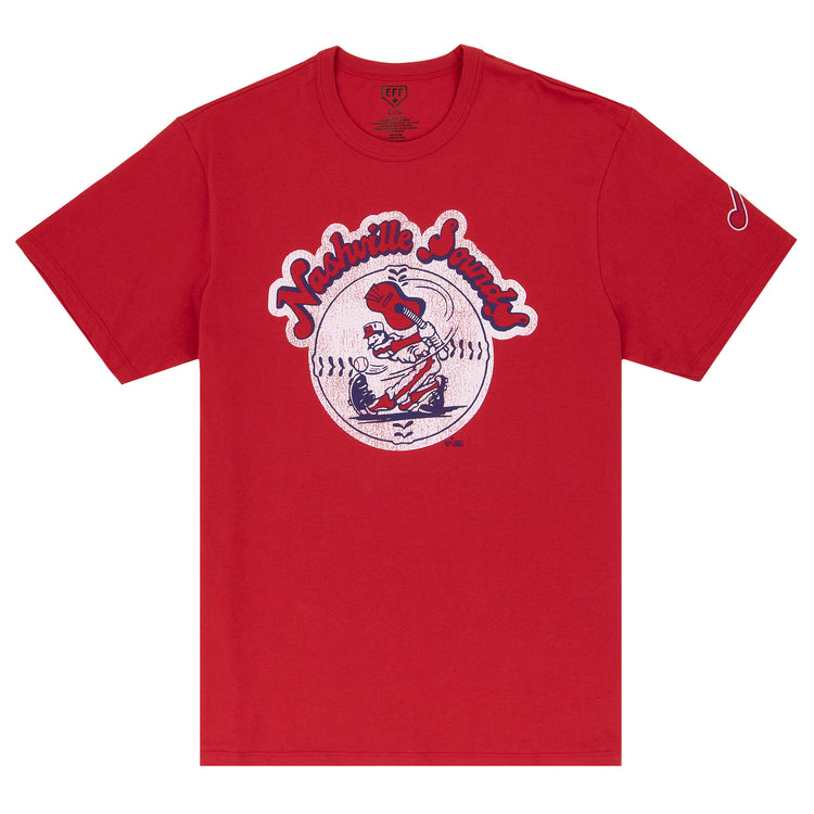 Show your support for the Nashville Sounds with this Ebbets Field Flannels EFF MiLB Vintage T-Shirt, featuring a retro cartoon baseball player swinging a bat in front of a record—ideal for vintage Minor League fans.