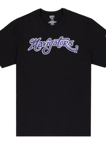 The Norwich Navigators EFF MiLB Vintage T-Shirt by Ebbets Field Flannels is a black tee with Navigators in bold purple and white script across the chest and a small colorful graphic on the left sleeve, inspired by classic Minor League styles.