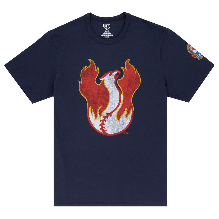 The Phoenix Firebirds EFF MiLB Vintage T-Shirt by Ebbets Field Flannels features a flaming baseball graphic on navy blue, a colorful left sleeve patch, and is inspired by vintage Pacific Coast League designs.