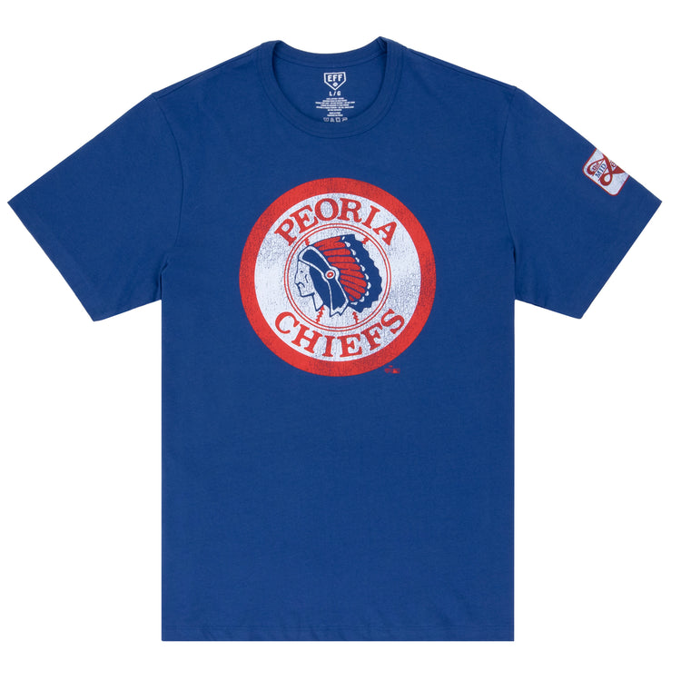 The Ebbets Field Flannels Peoria Chiefs EFF MiLB Vintage T-Shirt features a blue design with a circular Chiefs logo and patch on the left sleeve. Made of premium cotton, it’s perfect for fans of retro Minor League baseball shirts.