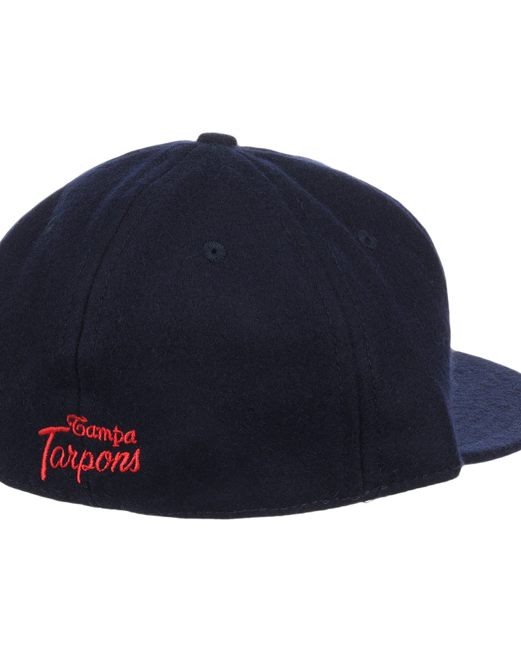 The EFF Tampa Tarpons Letterhead Wool Vintage Ballcap, in navy, features “Tampa Tarpons” embroidered in red script on the back left. The Minor League cap is shown from the back right against a white background.