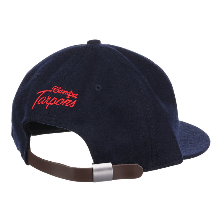 The EFF Tampa Tarpons Letterhead Wool Vintage Ballcap is a navy blue cap with red Tampa Tarpons embroidery on the back and an adjustable brown leather strap with silver buckle, perfect for Minor League baseball fans.