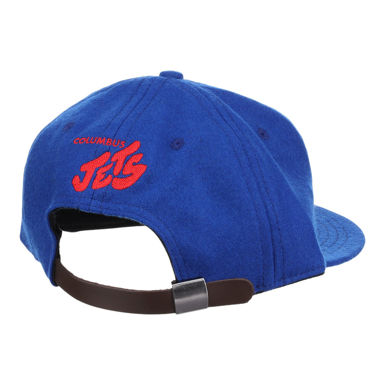 The EFF Columbus Jets Letterhead Wool Vintage Ballcap is a blue Minor League hat viewed from the back, featuring red embroidered COLUMBUS JETS text and a brown adjustable strap with metal clasp.