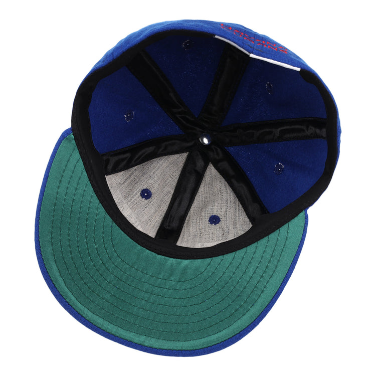 The underside of the EFF Havana Cubans Letterhead Wool Vintage Ballcap features a green brim, black inner lining, and exposed stitching on the interior panels.