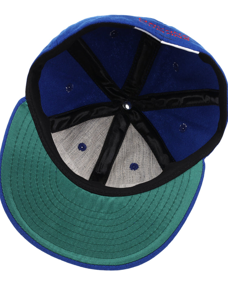 The underside of the EFF Havana Cubans Letterhead Wool Vintage Ballcap features a green brim, black inner lining, and exposed stitching on the interior panels.