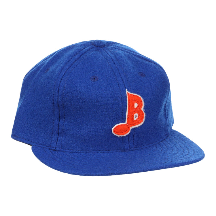 The EFF Memphis Blues Letterhead Wool Vintage Ballcap is a royal blue cap with a flat brim, featuring a red and white stylized B on the front—a classic tribute to Texas League Minor League baseball style.