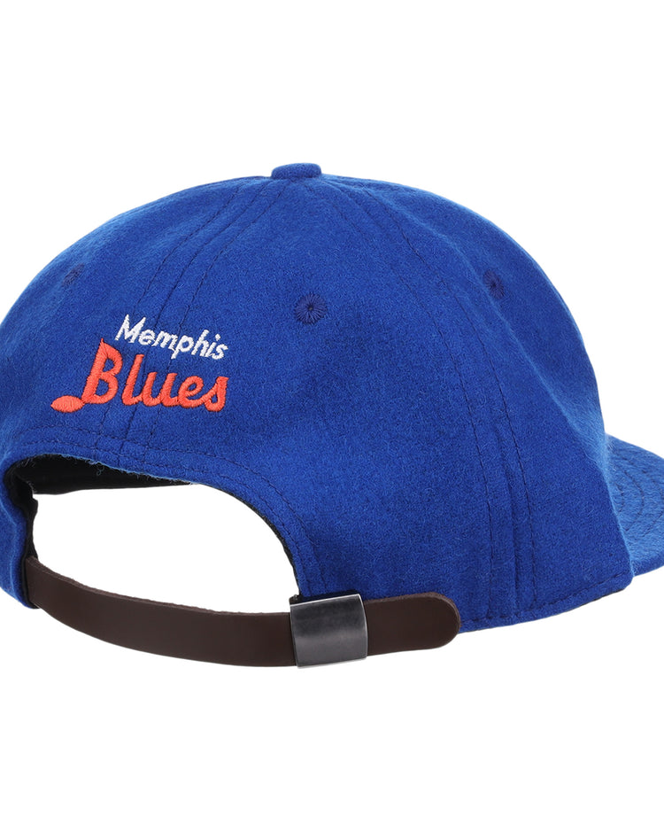 The EFF Memphis Blues Letterhead Wool Vintage Ballcap is a blue Minor League cap with Memphis Blues embroidered in white and orange, a brown adjustable strap with black buckle, inspired by classic Texas League style.